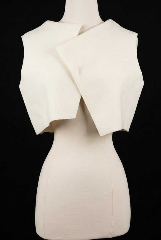 An off-wihte wrap vest